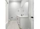 Clean bathroom with white vanity and a bathtub at 3421 W Horatio St # 109, Tampa, FL 33609