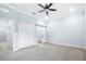 Spacious bedroom with carpet, ceiling fan and access to bathroom at 3421 W Horatio St # 109, Tampa, FL 33609