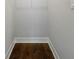 Walk-in closet with dark wood flooring and neutral walls at 3421 W Horatio St # 109, Tampa, FL 33609