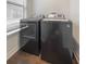 Laundry closet with a washer and dryer at 3421 W Horatio St # 109, Tampa, FL 33609