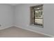 Bedroom with tile flooring and window with blinds at 3455 Countryside Blvd # 34, Clearwater, FL 33761