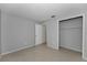 Simple bedroom with tile floor and spacious closet at 3455 Countryside Blvd # 34, Clearwater, FL 33761