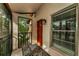 Condo entryway with screened porch and tiled floor at 3455 Countryside Blvd # 34, Clearwater, FL 33761