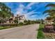 Residential community street view with landscaping at 3455 Countryside Blvd # 34, Clearwater, FL 33761