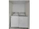 Laundry closet with washer and dryer included at 3455 Countryside Blvd # 34, Clearwater, FL 33761