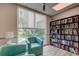 Library with comfortable seating and floor to ceiling bookshelves at 400 64Th Ave # 502, St Pete Beach, FL 33706