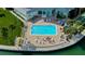 Community swimming pool with plenty of room for sunbathing and recreation at 400 64Th Ave # 502, St Pete Beach, FL 33706