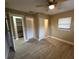 Bright bedroom with tile floors and ample closet space at 4108 W Oakellar Ave, Tampa, FL 33611