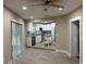 Open dining area with views into a modern kitchen at 4108 W Oakellar Ave, Tampa, FL 33611