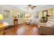 Living room featuring hardwood floors, neutral color palette, and ample natural light at 4334 3Rd N Ave, St Petersburg, FL 33713