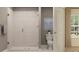 Bathroom with a walk-in shower and white tile at 4511 S Manhattan Ave # 19, Tampa, FL 33611