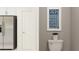 Modern bathroom with toilet and stylish wall art at 4511 S Manhattan Ave # 19, Tampa, FL 33611