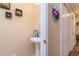 Small powder room with pedestal sink at 4533 Ashburn Square Dr # 4533, Tampa, FL 33610