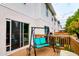 Deck with teal swing and string lights at 4533 Ashburn Square Dr # 4533, Tampa, FL 33610