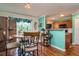 Dining area with round table and chairs, near the kitchen at 4533 Ashburn Square Dr # 4533, Tampa, FL 33610