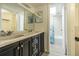 Bathroom with double vanity and shower/tub combo at 4715 Christa Ct # 334, Tampa, FL 33614