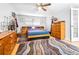 Spacious bedroom with wood furniture and patterned rug at 509 Oakhurst St, Brandon, FL 33511