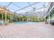 Inviting screened pool with brick patio and covered lanai at 509 Oakhurst St, Brandon, FL 33511