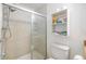 Clean bathroom with shower/tub combo and updated vanity at 5322 Comanche St, Zephyrhills, FL 33542