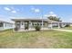 Well-maintained manufactured home with covered carport at 5322 Comanche St, Zephyrhills, FL 33542