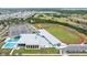 Aerial view of a community recreation center with pool and track at 5816 Woodrow Wilson Ne Blvd, St Petersburg, FL 33703