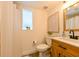 Clean bathroom with a modern vanity, shower, and updated fixtures at 5816 Woodrow Wilson Ne Blvd, St Petersburg, FL 33703