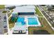 Aerial view of community pool, recreation center and playground at 5816 Woodrow Wilson Ne Blvd, St Petersburg, FL 33703