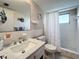 Bright bathroom, marble countertop, shower stall at 5890 38Th N Ave # 101, St Petersburg, FL 33710