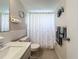 Clean bathroom with marble vanity and shower at 5890 38Th N Ave # 101, St Petersburg, FL 33710