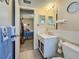 Simple bathroom with a vanity and toilet at 5890 38Th N Ave # 101, St Petersburg, FL 33710