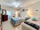 Guest bedroom with two twin beds and coastal decor at 5890 38Th N Ave # 101, St Petersburg, FL 33710