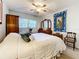 Spacious bedroom with a king-size bed and ample closet space at 5890 38Th N Ave # 101, St Petersburg, FL 33710