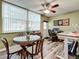 Bright dining area with glass-top table and wicker chairs at 5890 38Th N Ave # 101, St Petersburg, FL 33710