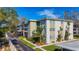 Two-story condo building with lush landscaping and ample parking at 5890 38Th N Ave # 101, St Petersburg, FL 33710