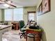 Bright office space with wood desk and green chair at 5890 38Th N Ave # 101, St Petersburg, FL 33710