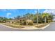 House on a corner lot with mature trees and landscaping at 599 Centerwood Dr, Tarpon Springs, FL 34688