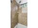 Bathroom with tiled shower/tub combo and single shower head at 599 Centerwood Dr, Tarpon Springs, FL 34688