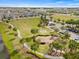 Community park with walking paths, playground, picnic area, and sprawling green space at 6307 Brevada Ln, Apollo Beach, FL 33572