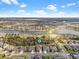 Wide aerial shot capturing the neighborhood, showcasing the harmonious blend of homes, lakes and greenery at 6307 Brevada Ln, Apollo Beach, FL 33572