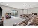 Upstairs bonus room with plush carpet and a sliding glass door to the balcony at 6307 Brevada Ln, Apollo Beach, FL 33572