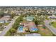 Aerial view showing house, pool, and surrounding homes at 6327 5Th Street E Cir, Bradenton, FL 34203