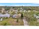 Aerial view of house with pool and neighborhood at 6327 5Th Street E Cir, Bradenton, FL 34203