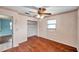 Light and airy bedroom with wood floors and an ensuite bathroom at 6327 5Th Street E Cir, Bradenton, FL 34203