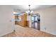 Kitchen featuring wood cabinets, tiled floors, and a window at 6327 5Th Street E Cir, Bradenton, FL 34203