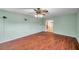 Living room with hardwood floors, a fireplace and an archway at 6327 5Th Street E Cir, Bradenton, FL 34203