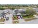 Aerial view of a house with a pool and two-car garage, situated near a canal at 6931 Silvermill Dr, Tampa, FL 33635