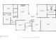 Floor plan displaying a 2-bedroom, 2-bathroom house with a living room, kitchen, and garage at 6931 Silvermill Dr, Tampa, FL 33635