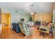 Living room with hardwood floors and a fireplace at 6931 Silvermill Dr, Tampa, FL 33635