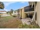 Back patio with access to the ground floor unit at 7300 Sunshine Skyway S Ln # 108, St Petersburg, FL 33711