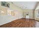 Bright living room with hardwood floors and built-in shelves at 7473 Willow Brook Dr, Spring Hill, FL 34606